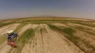 Drone skycam following farmer